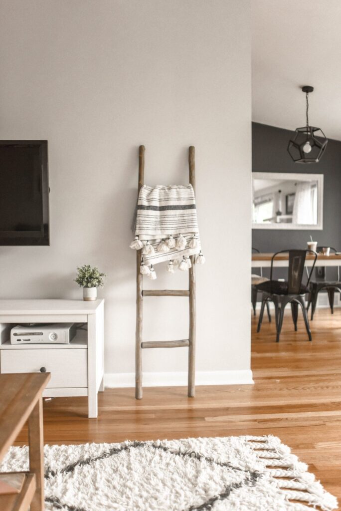 engineered-wood-flooring-Galway Gray Wooden Ladder on White Painted Wall